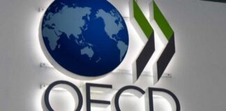 Οικονομία υπό Σκιάν: Πόλεμος στο Ιράν Επιβαρύνει την Παγκόσμια Ανάπτυξη